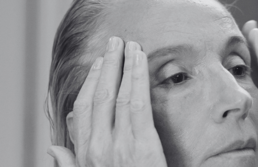 Close-up of mature woman's face showing fine lines and wrinkles around the eyes