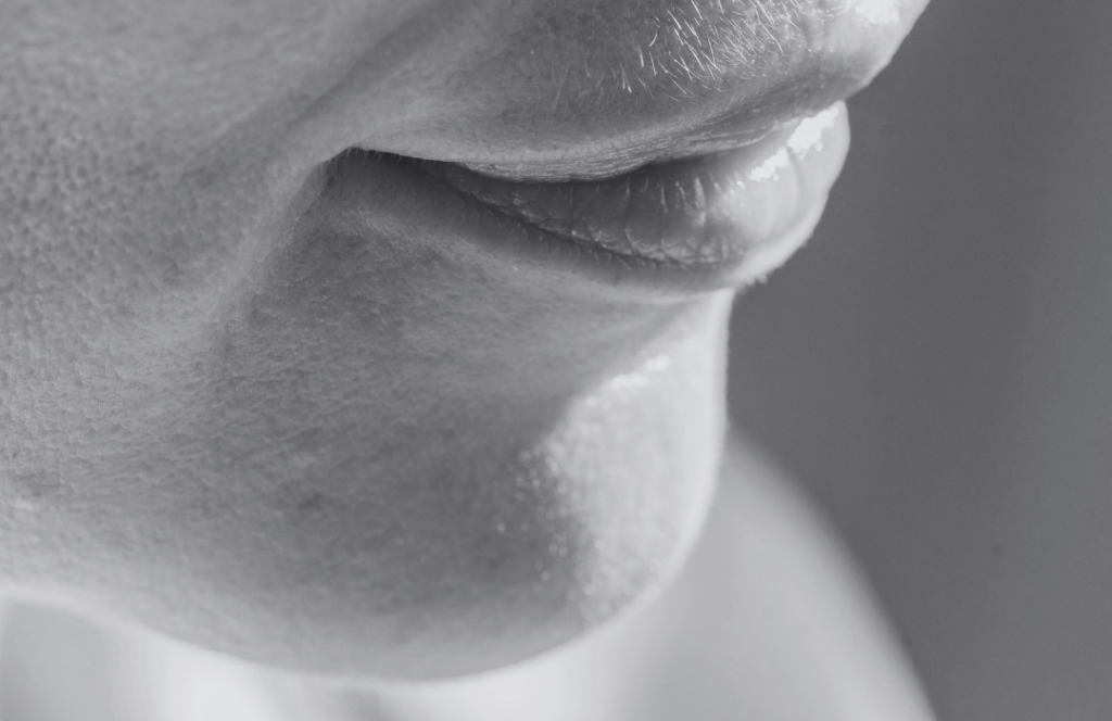 Close-up of skin showing uneven texture and rough surface